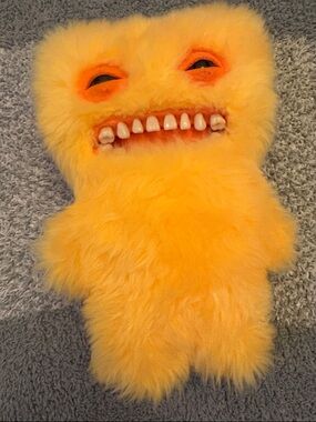 Plush Fuzzy Yellow Creature Pillow